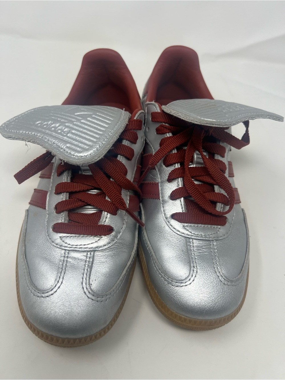 Adidas Women’s Metallic Silver Sneakers with Burgundy Accents